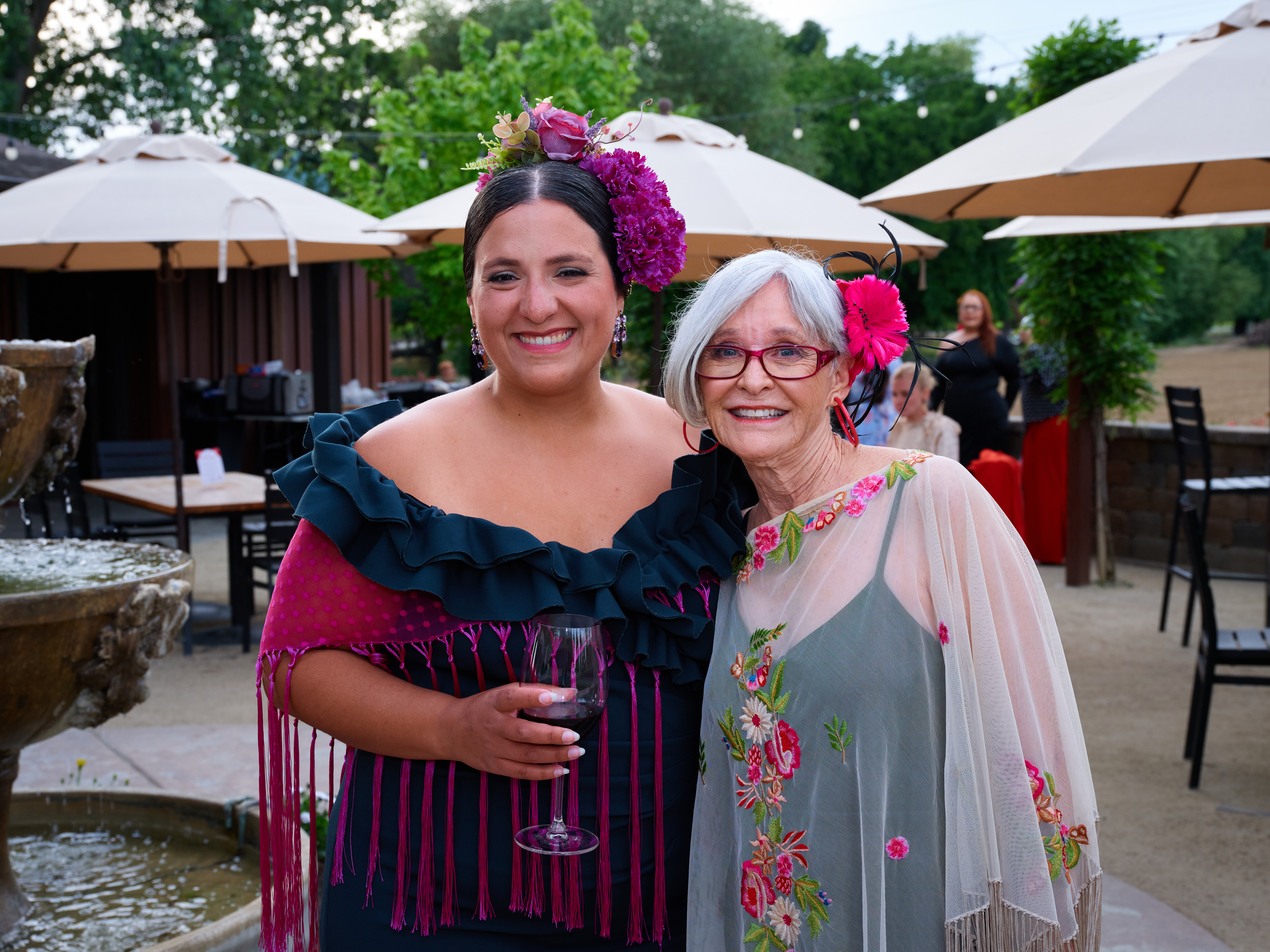 Angela Arteritano with community member at Feria de Abril
